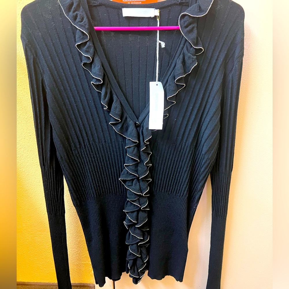 NWT beautiful sweater blouse button down with ruffles and white trim.